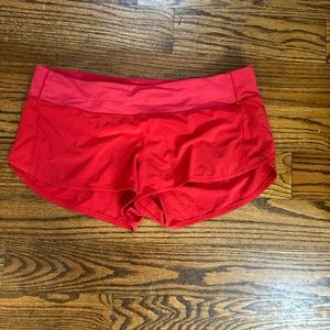 Lululemon women’s size 12 Speed Up shorts in excellent condition. Red in color.